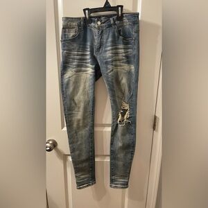 AMIRI Distressed Faded Blue Skinny Jeans